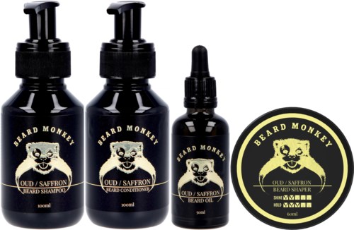 Ein Set aus vier schwarzen Bartpflegeprodukten, inklusive Shampoo, Conditioner, Öl und Haarstyler, alle mit Affenlogo.