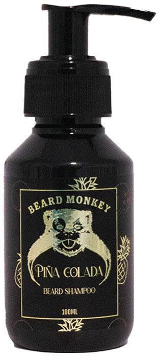 Musta pumppupullo, jossa lukee 'Beard Monkey Pina Colada Beard Shampoo', sisältää 100 ml.