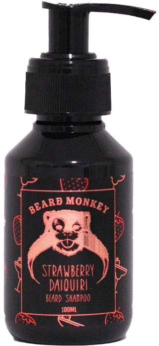 Eine schwarze Flasche mit Pumpe enthält Beard Monkey Strawberry Daiquiri Bartshampoo. Es zeigt ein Affenlogo und roten Text.