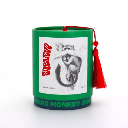 Green container with a red tassel, featuring a monkey illustration and text about beard and perfume.