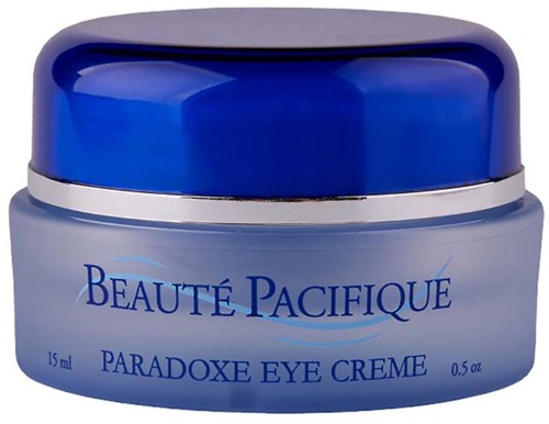 Ein kleine blaue Dose mit passendem blauen Deckel, beschriftet als Beauté Pacifique Paradoxe Eye Creme.