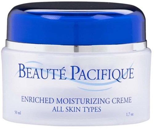 A white and blue jar of Beauté Pacificque enriched moisturizing cream for all skin types.