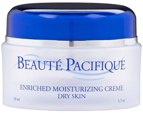Biały słoik z niebieską pokrywką, oznaczony 'BEAUTÉ PACIFIQUE' i 'Enriched Moisturizing Creme Dry Skin.'