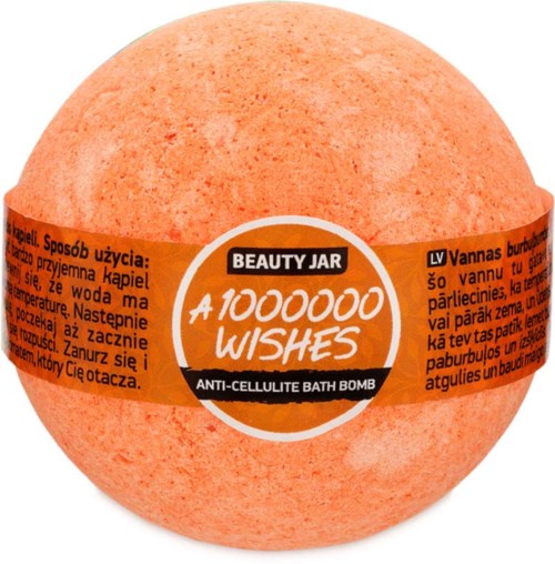 En runt badbomb märkt 'Beauty Jar A 1 000 000 Wishes' i orange färg med svart och vitt text.
