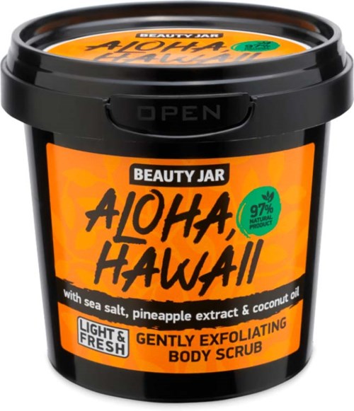 Ein schwarzer Behälter mit orangefarbenem Etikett. Es ist ein Körperpeeling mit Meersalz, Ananasextrakt und Kokosöl, genannt "Aloha, Hawaii."