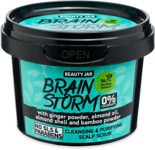 Eine türkisfarbene Dose mit Aufschrift 'Brain Storm', enthält Kopfhautpeeling mit Ingwer, Mandelöl und Mandelhaut, ohne Farbstoffe, Parabene und SLS.