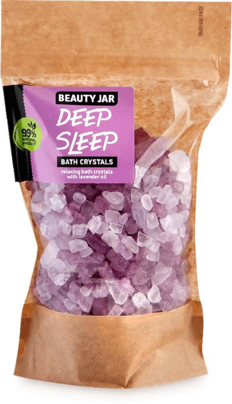 A bath crystal product named 'Deep Sleep' in a brown and purple package with a transparent window.