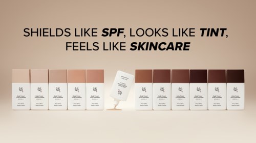 A line of skincare product boxes with a caption describing them as protective, tinted, and skincare-like.