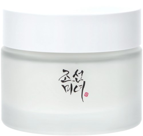 A white jar with black Korean characters and a small red seal on the front.
