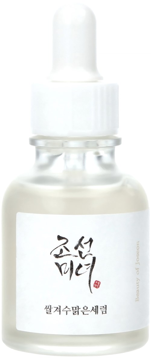 A small, white bottle with a dropper, labeled in Korean, likely a skincare or cosmetic product.