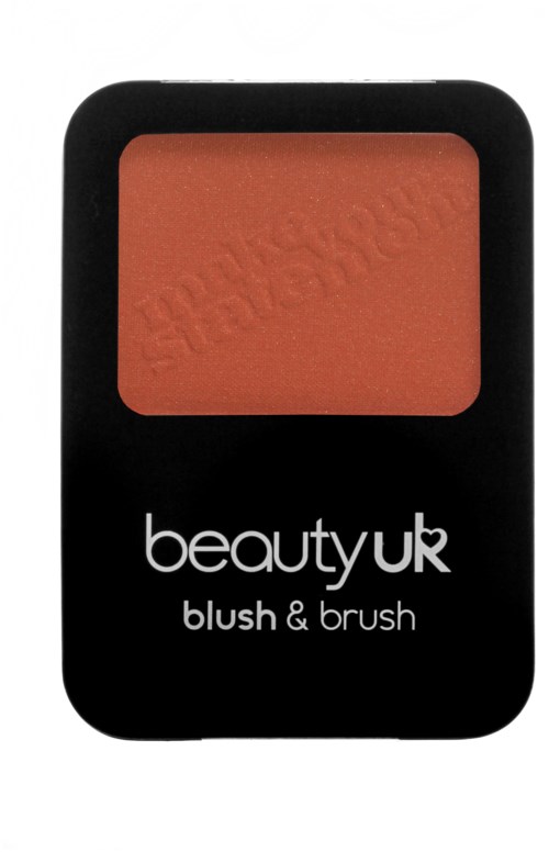 En liten sminkask med persikofärgad rouge och en borste, märkt 'beauty uk blush & brush.'