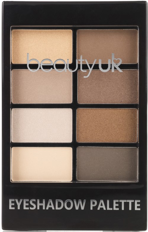 En svart låda innehåller nio neutrala ögonskuggor i ett rutnät. Boxen är märkt 'EYESHADOW PALETTE'.