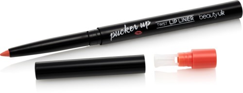 A black stroke marker with a coral-colored cap, lying beside its removed cap, labeled 'pucker up' and 'TWIST LIP LINER'.