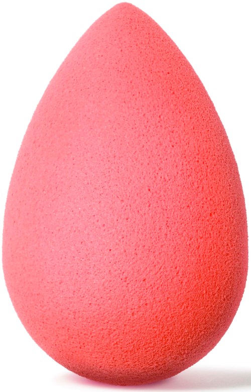 A pink teardrop-shaped makeup sponge with a rough texture.