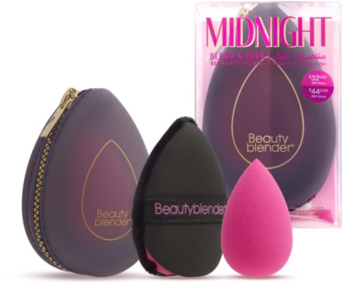 Beauty blender makeup sponges in black, pink, and purple, with box and black case. Small, soft, and rounded shapes.
