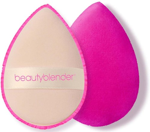 A pink and beige makeup sponge with the label "beautyblender" on it.