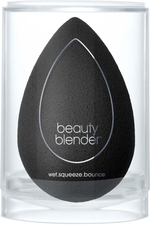 A black teardrop-shaped beauty blender inside a clear container, with white text and a thin white outline.