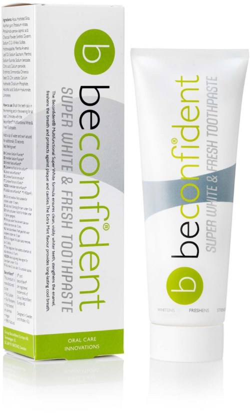 Be confident Zahnpasta-Box und Tube mit grünem und weißen Design, für super weiße und frische Zähne.