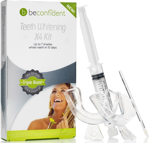Teeth whitening kit with syringes, a pen, and a box showing a smiling woman. Promotes quick results in ten days.