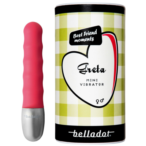 A pink mini vibrator next to packaging with green checkered background, black and white text, and a heart and apple design.