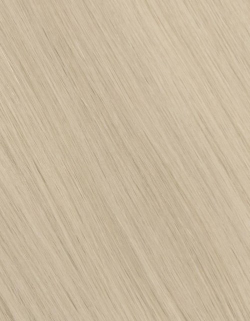De afbeelding toont een beige, getextureerde oppervlakte met diagonale lijnen of strepen.