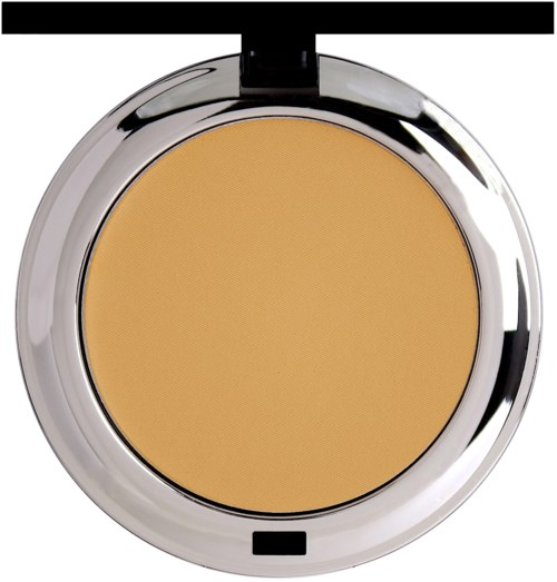 The image shows a compact makeup powder with a golden-beige color and a shiny silver outer case.