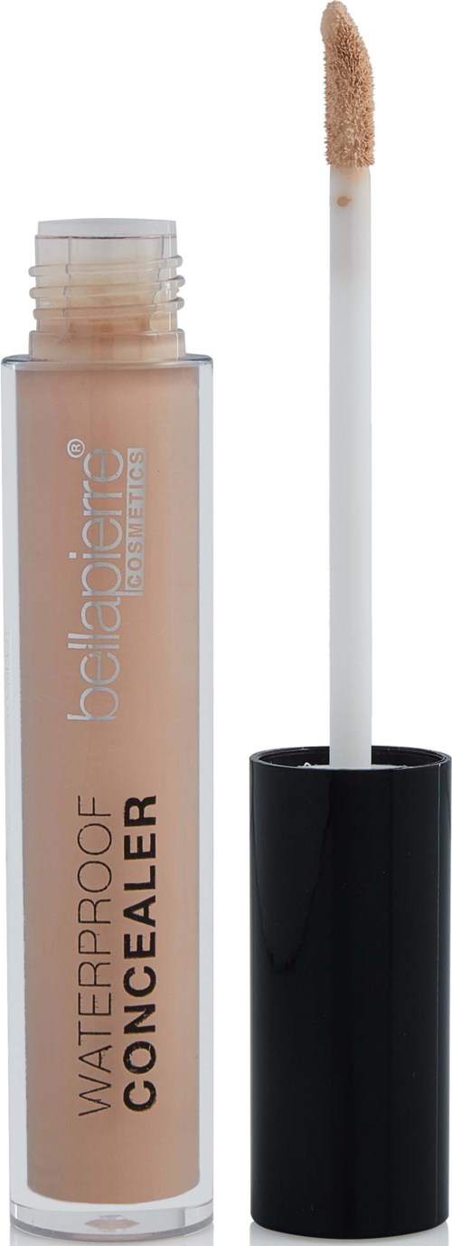 A concealer tube with a wand applicator and beige-colored liquid inside.