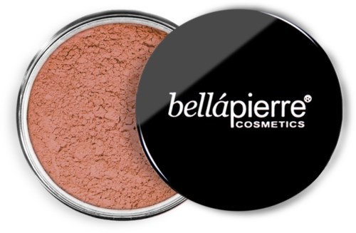 A makeup container with pink powder and a black lid that has white text saying "bellápierre cosmetics."