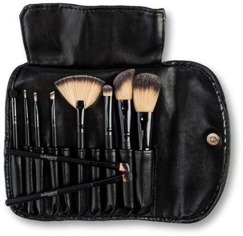 A black case with makeup brushes inside, including fan, rounded, and tapered brushes, neatly arranged.
