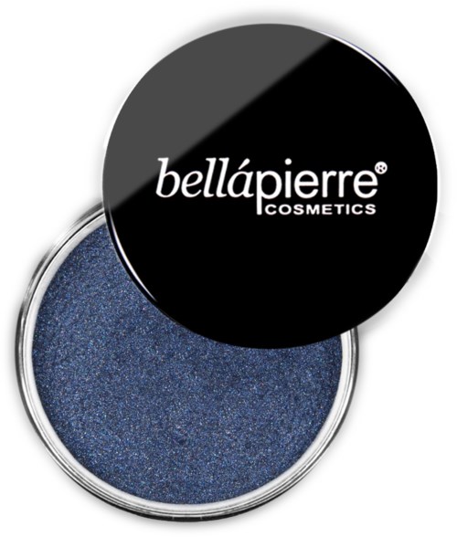 Black lid with white text, open blue glitter eyeshadow in a round container.