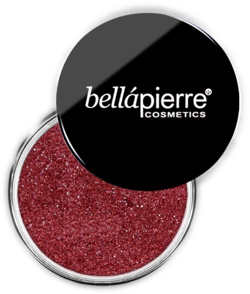Röd glittermakeupprodukt i en tydlig behållare med svart lock med logotypen 'bellápierre COSMETICS'.