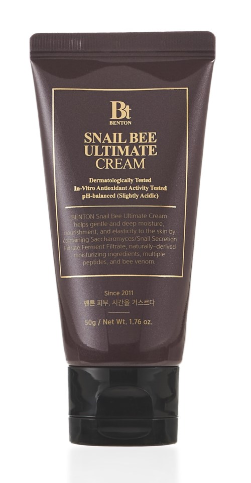 Donkerbruine tube met 'Snail Bee Ultimate Cream' met goud en wit tekst, rechtopstaand.