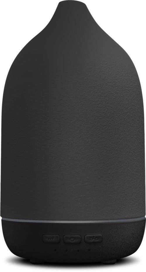 En svart, oval formad ansiktsångare med kontrollknappar längst ned och en texturerad yta.