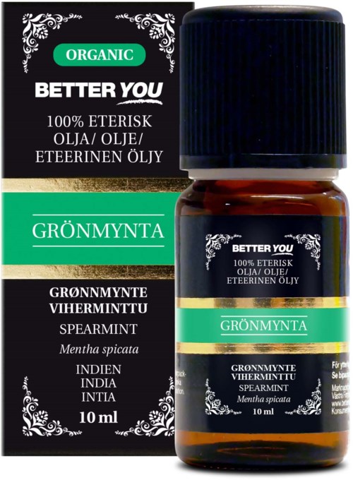 En liten flaske med spearmint essensiell olje ved siden av boksen sin, begge med svart, grønt og gullfarger, merket på finsk.