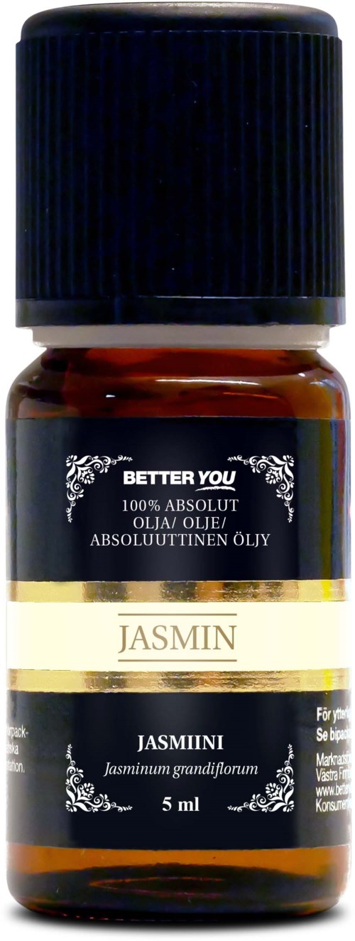 Pieni ruskea pullo jasmin-eteerisen öljyn kanssa, musta korkki ja etiketti.