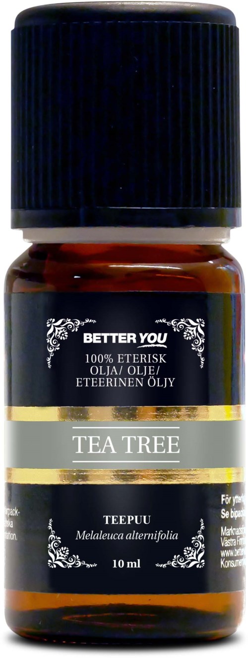 En liten brun flaske med svart lokk inneholder teeTree-essensiell olje, merket på engelsk og finsk.