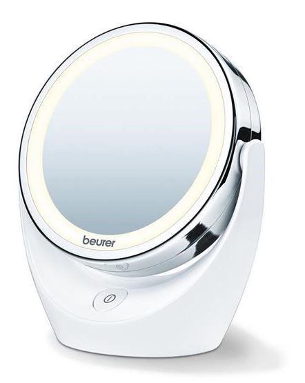 Een witte make-upprooster met een ronde LED-licht, merknaam 'beurer', en een touchknop onderaan.