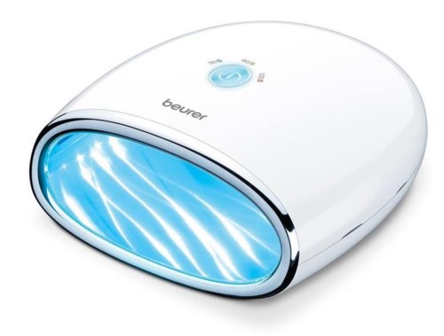 Een wit apparaat met Een fel blauw licht, gemerkt 'beurer', gebruikt voor lichttherapie of tanning.