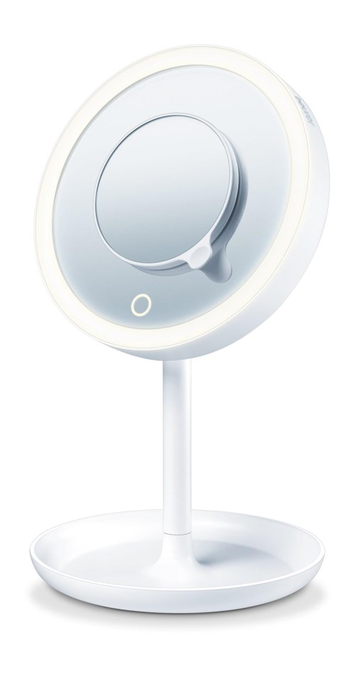 Een ronde spiegel met standaard en ingebouwd licht, ziet er modern en stijlvol uit.