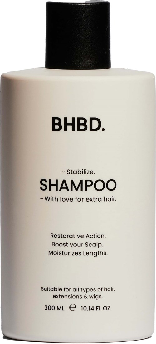 A white shampoo bottle with a black cap, labeled BHBD Stabilize Shampoo, for extra hair care, information in black text.
