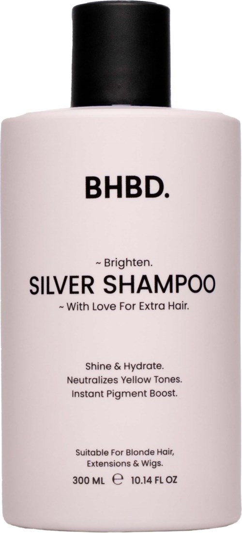 A white bottle of Silver Shampoo with black cap, labeled for brightening and neutralizing yellow tones.