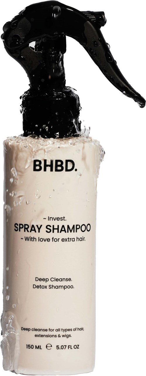 A white bottle with black text and a black spray nozzle, labeled as shampoo for hair cleaning.