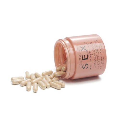 Pink bottle with capsules spilling out, labeled 'SEX' and 'organic, plant-based, vegan, cruelty-free.'