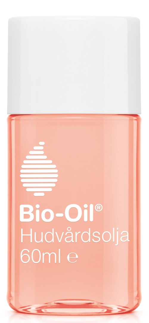 Klein flesje Bio-Oil huidverzorgingsolie met witte dop en roze vloeistof binnen.