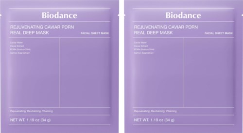 Two purple packets labeled Biodance Rejuvenating Caviar PDRN Real Deep Mask with space for details.