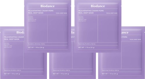 Five purple packets of Biodance caviar face masks are displayed, highlighting skin care product packaging.