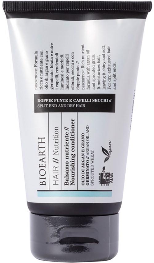 Een witte tube met zwarte dop, bevat haarverzorgingsproduct voor gespleten haarpunten en droog haar, met Italiaanse tekst.