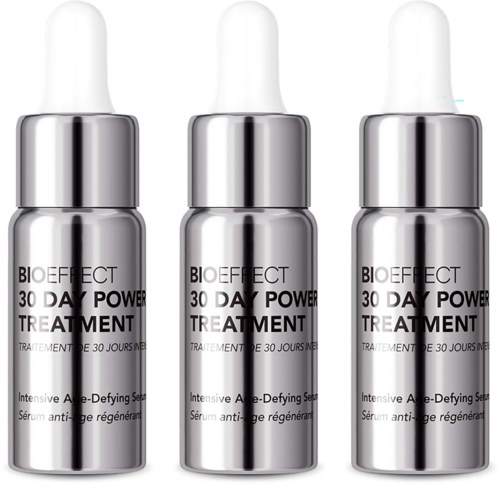 Three silver bottles of Bioeffect 30 Day Power Treatment with droppers, used for skincare.