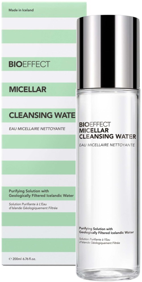 A clear bottle of cleansing water next to its green and white box, labeled Bioeffect Microcell Cleansing Water.