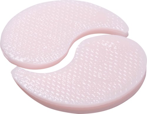 Två rosa ansiktssvampar med texturerade ytor för rengöring eller hudvårdsrutiner.